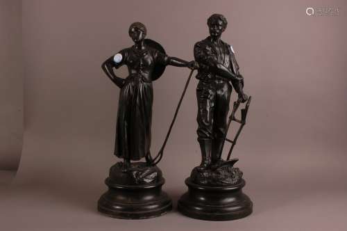 A pair of late Victorian large spelter figures, indistinctly...