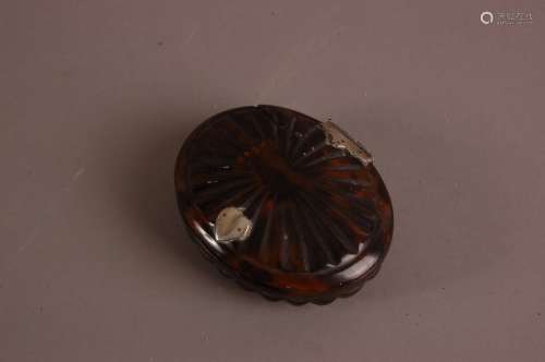 A Georgian tortoiseshell oval box, damaged, 9.5cm, carved to...