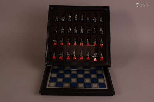 A modern Franklin Mint Battle of Waterloo chess set, 35cm wi...