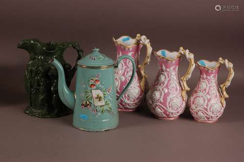 A set of three graduated Victorian Staffordshire pottery jug...