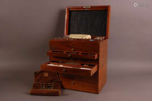 A vintage dentist's tools and equipment box, 33cm wide and 3...