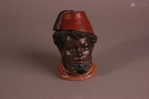 A late 19th century German ceramic figural tobacco jar, 14cm...