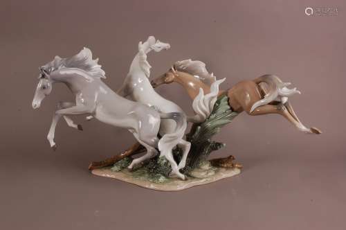 A large Lladro porcelain horse sculpture, 70cm wide, profess...