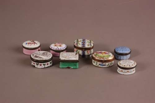 Eight 19th century porcelain or enamelled patch and other bo...