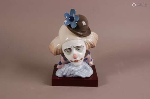 A Lladro porcelain figure of a sad clowns head, 26.5cm, prof...