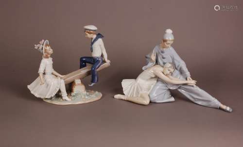 Two modern Lladro porcelain figural groups, one of a male an...