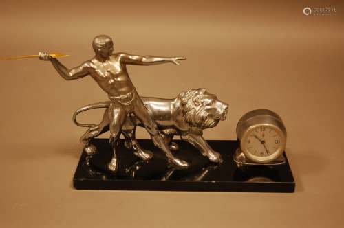 An Art Deco Period French chromed and black marble figural c...