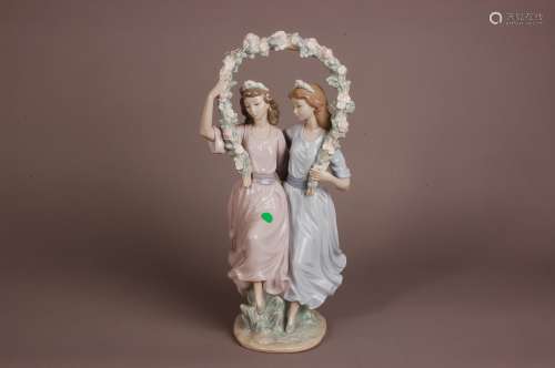 A modern Lladro porcelain figural group, 39cm, modelled as t...