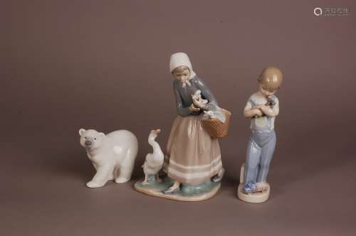 Three modern Lladro porcelain figures, one of a young girl w...