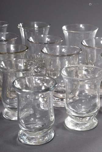 15 Various tulip glasses on a bulbous base, clear glass, ear...