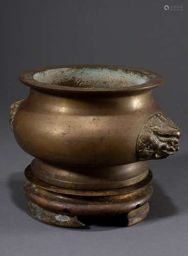 Bronze Koro with large lion head mascarons and tripod openwo...