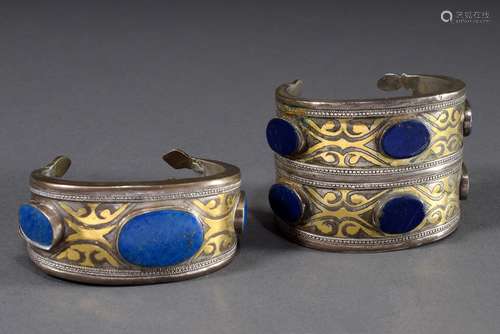 2 Various Afghan bangles with 3 resp. 5 oval lapis lazuli pl...