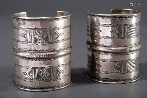 2 Various wide Afghan bangles with slightly different engrav...