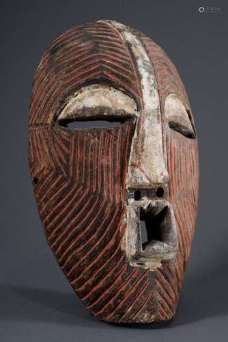 Songye women's mask of the Kifwebe secret society, wood with...