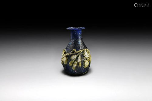 Roman Blue Glass Vessel with Vine Leaf Design