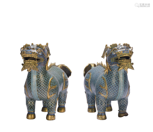 A pair of cloisonnÃ© enamel unicorn