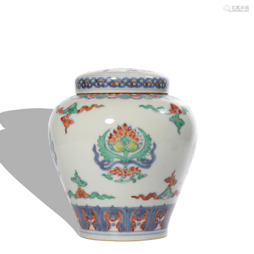 A Wu cai 'floral and birds' jar and cover