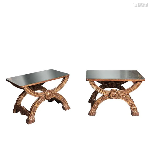 A pair of carving tea table