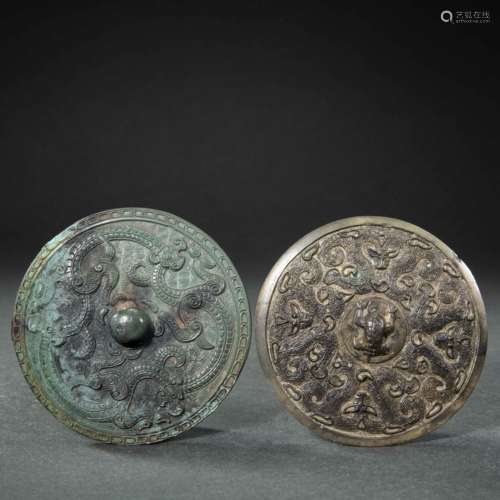 A PAIR OF CHINESE BRONZE DRAGON PATTERN MIRRORS FROM, WARRIN...