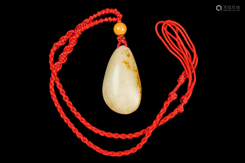 A Hotan (Hetian) Riverbank Jade Pendant with Stone skin