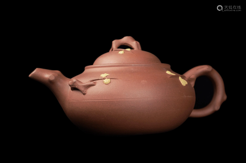 A Chinese Yixing Clay Teapot with Plum Branch Style