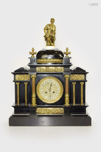 A Black Marble Mental Clock with Gilt Bronze Columns