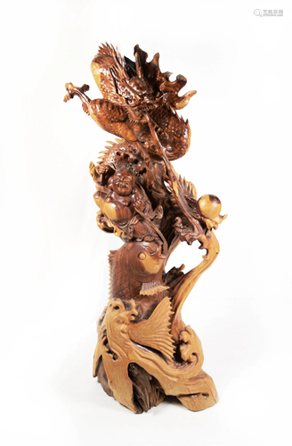 A Chinese Old Boxwood Carved Laughing Buddha and Dragon