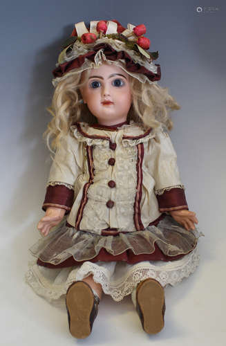 A Tete Jumeau bisque head doll, impressed '6' and printed 'D...