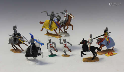 A good collection of Timpo Toys plastic figures of knights o...