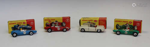 Four Dinky Toys cars, comprising a No. 240 Cooper racing car...