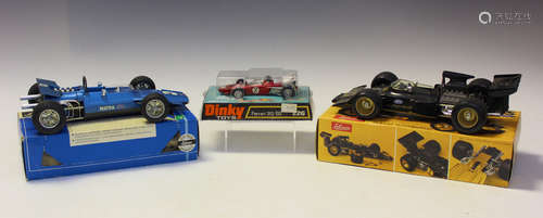 A collection of diecast vehicles, including two Schuco Formu...