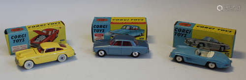 Three Corgi Toys cars, comprising a No. 218 Aston Martin DB4...