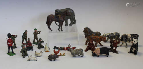 A collection of Britains and other lead farm animals and fig...