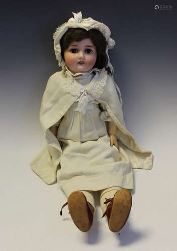 A Schoenau & Hoffmeister bisque head doll, impressed '1909 7...