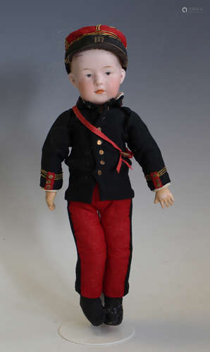 A bisque head boy doll, indistinctly impressed 'R IV - 2/0?'...