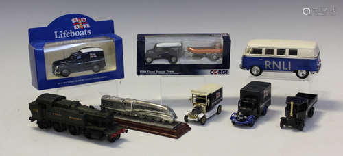 A collection of gauge OO model train parts, including wheels...