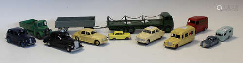 A small collection of diecast vehicles, including a Dinky Su...