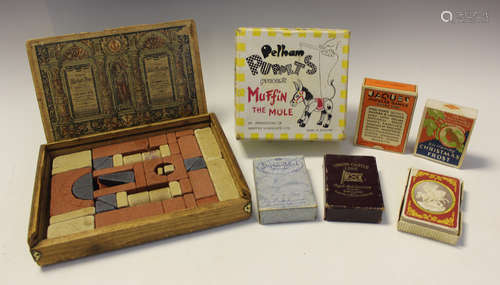 A collection of toys and games, including a Pelham Puppets M...