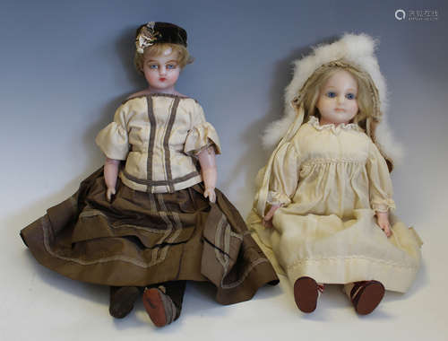 A wax over composition head and shoulders doll with blonde h...