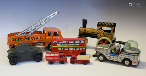 A small collection of tinplate and plastic mechanical toys, ...