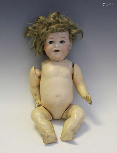 An Armand Marseille bisque head doll, impressed '990 A4M', w...