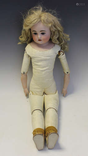 A German bisque head and shoulders doll, impressed 'L', with...