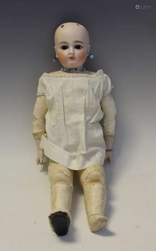 A bisque swivel head and shoulders doll, impressed 'O', with...