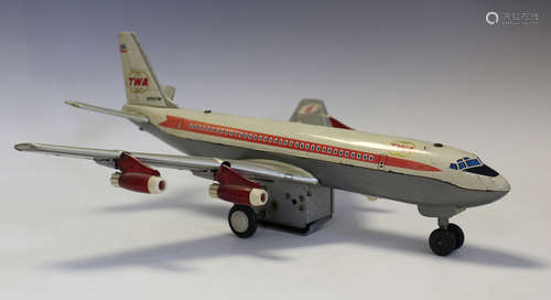 A Marx battery powered TWA passenger aircraft and an Airfix ...