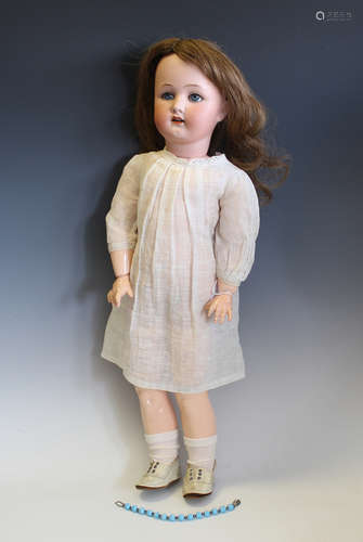 A Heubach Köppelsdorf bisque head doll, impressed '250·5 7',...