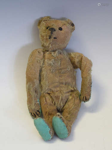 A Steiff mohair humpback teddy bear, circa 1910, with unders...