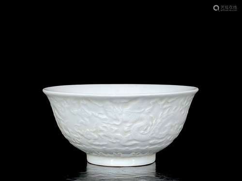 Ming xuandetian white glaze relief dragon bowl