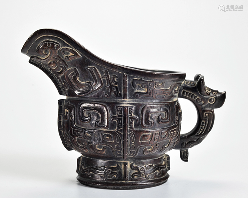 A Carved Archaistic Aloes-wood Wine Vessel Qing Dynasty