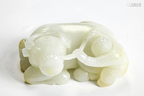 A Carved White Jade Kid with Buffalo Qing Dynasty