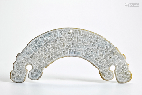 A Carved White Jade Bi Han Dynasty